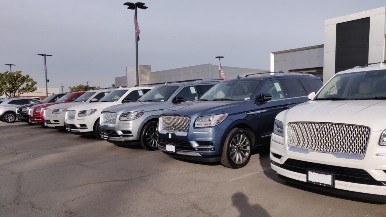 lineup of suv's at the dealership