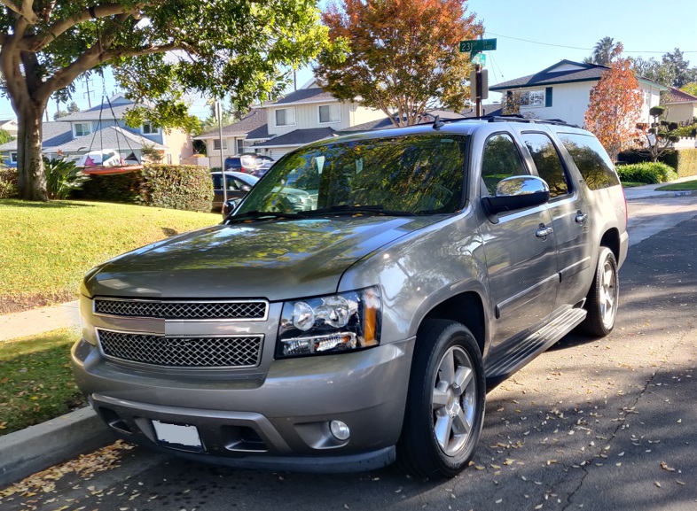 large size suv parked in neighborhood