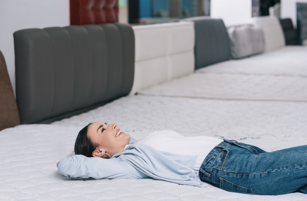 Woman Lying On Mattress